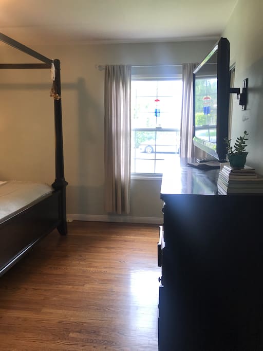 Welcome to your bright room with room darkening shade.