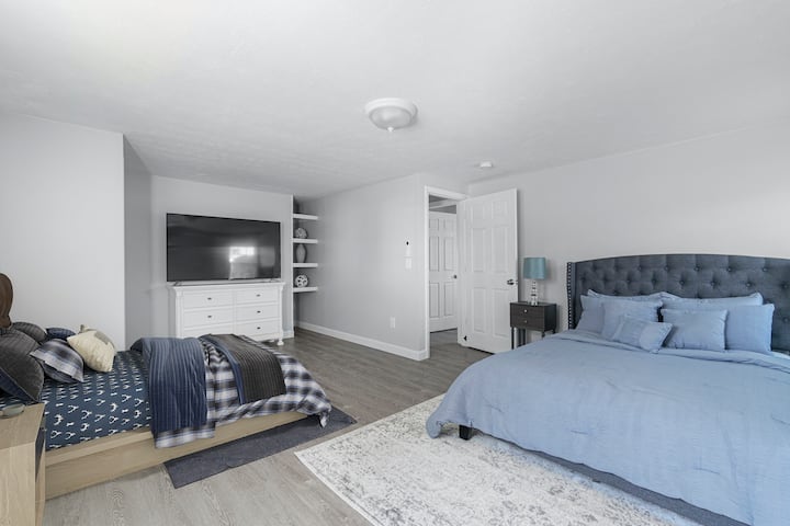 Bedroom #5, Lower Level, Queen Bed and additional Full Bed. Walk Out to Back Yard
