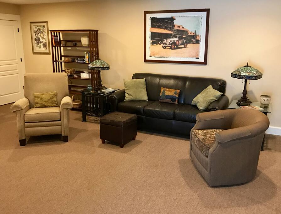 Great Room area with Sofa, Recliner, Barrel Chair and 55 inch TV with premium sound system.