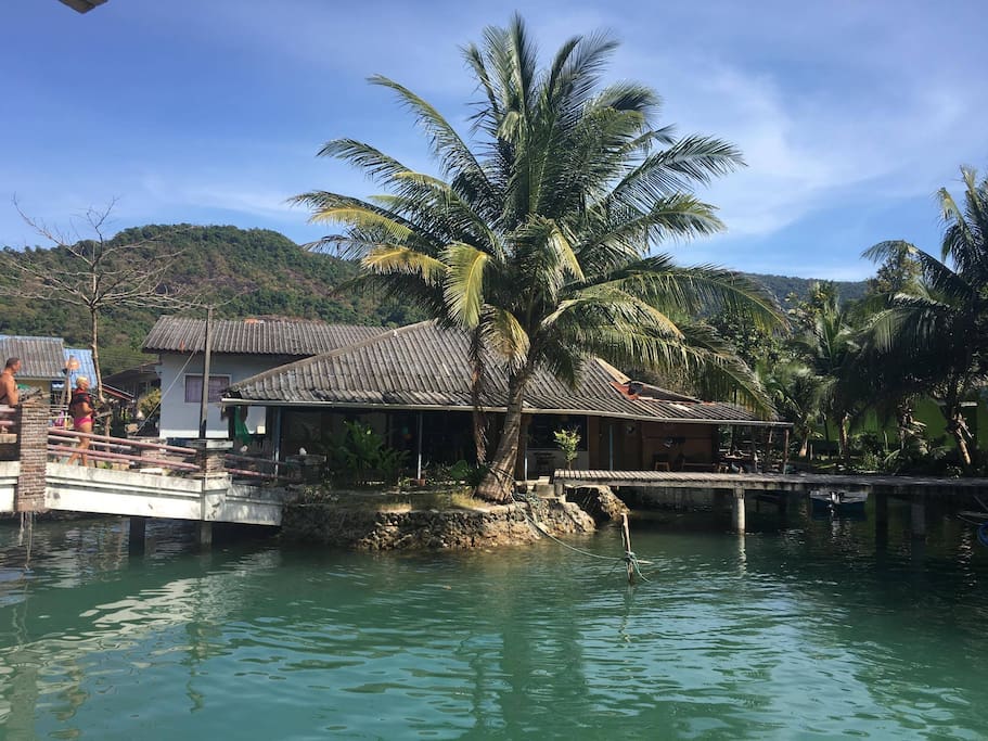 pic of the house from the sea (only left of the tree)