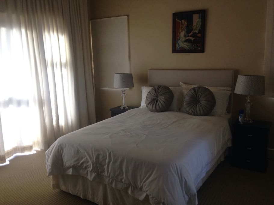 Bedroom with double bed and en-suite bathroom