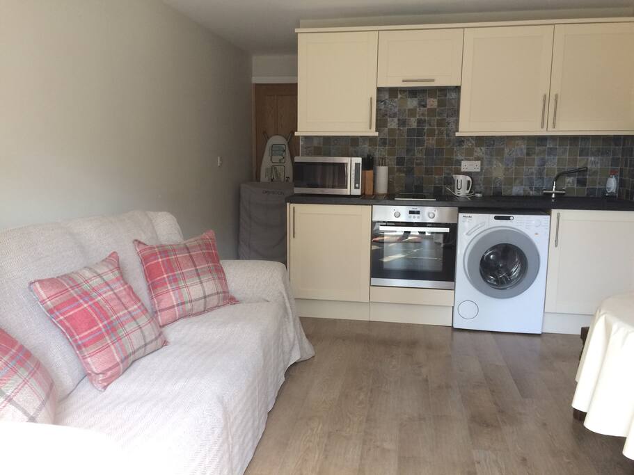 As you enter the property via the patio doors