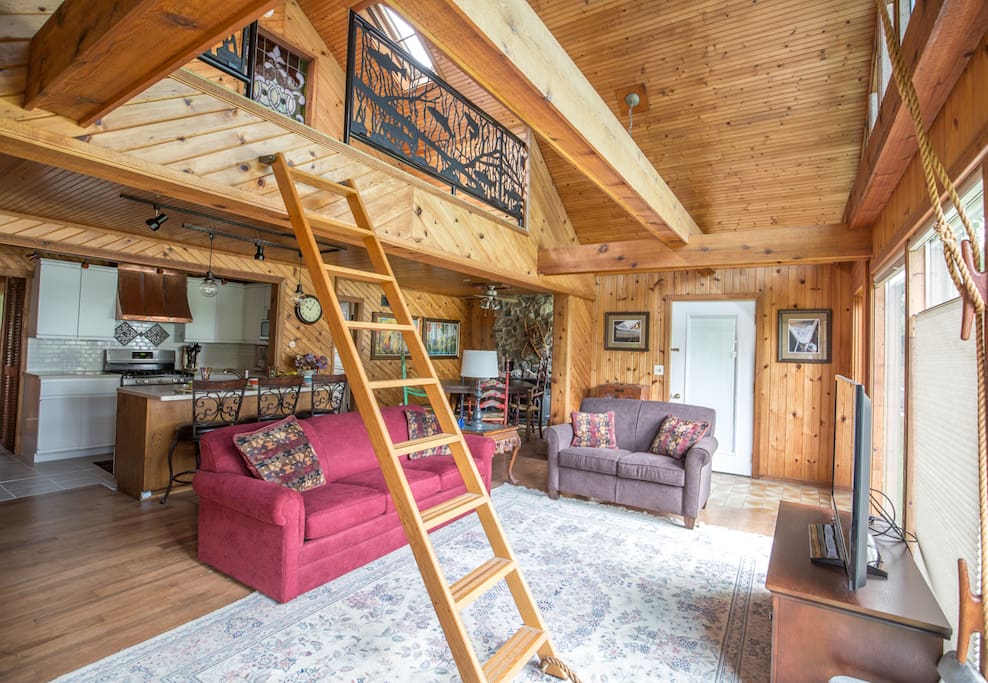 Main living area w/ ladder to loft overflow sleeping in down position.
