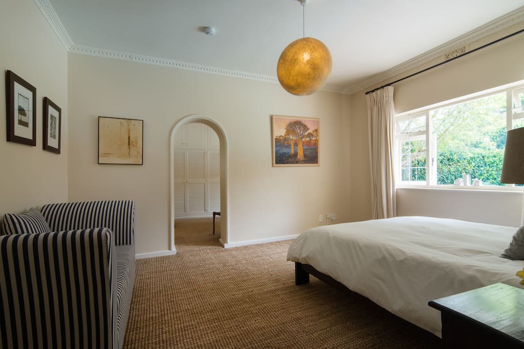Main Bedroom with doorway through to bathroom on suite and cloak room
