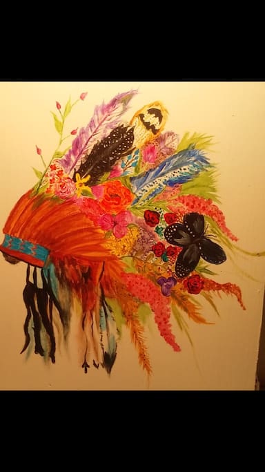 Hand painted artwork by my daughter-in-law adorn the cabinets in this sweet space.
