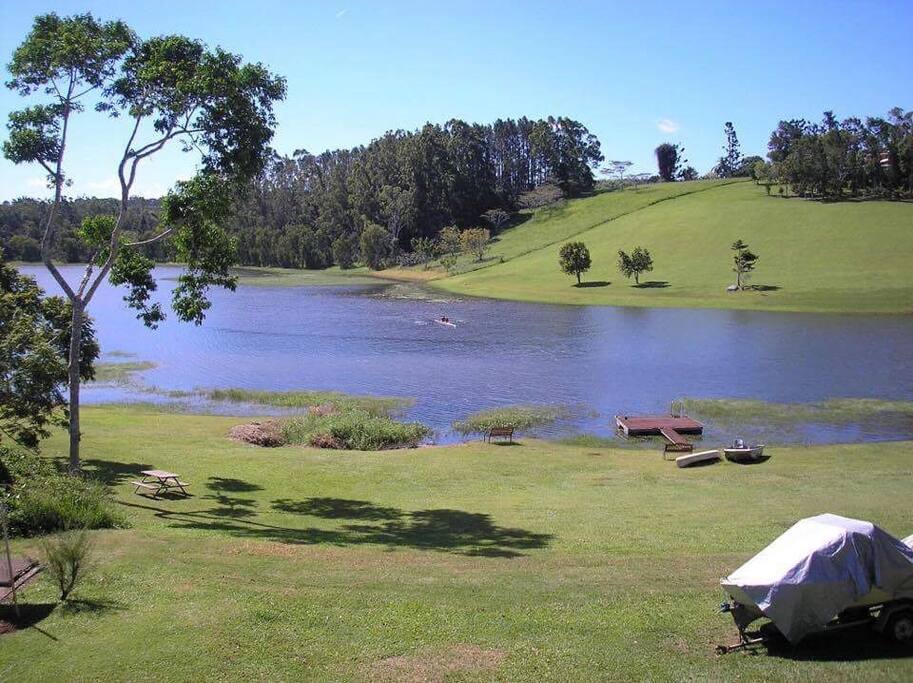 Absolute Lake frontage! View from the deck. Note: Lake is seasonal.