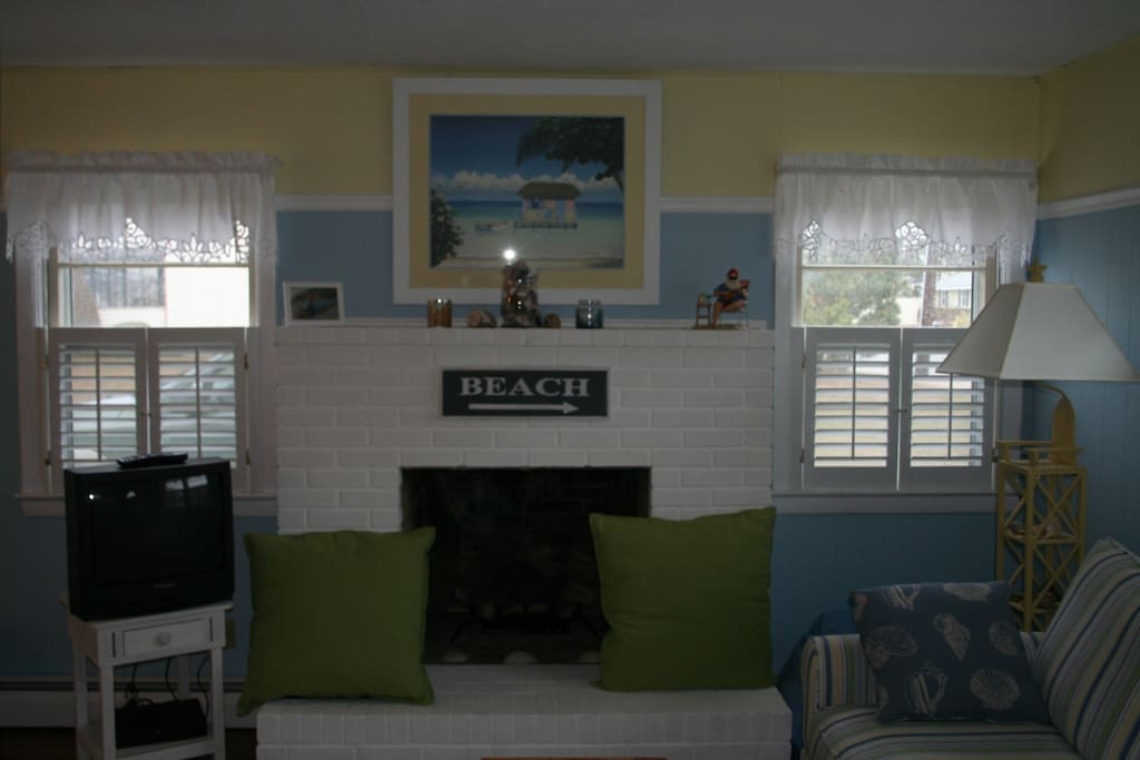 Family room area. We have updated to a flat screen television. New picture to come.