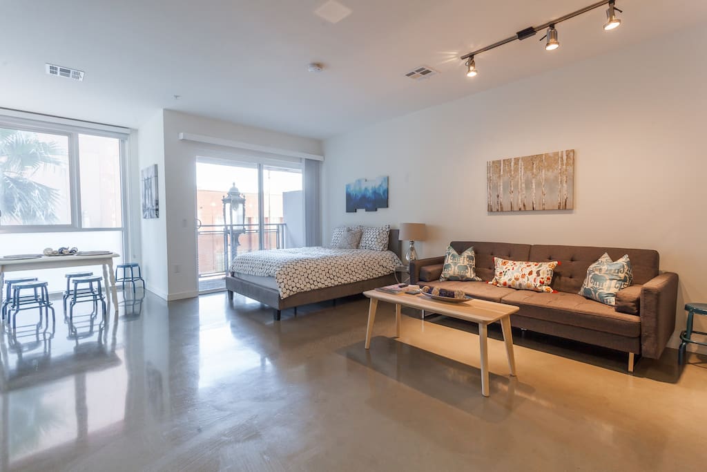 Queen Bed and Futon in the Living Room