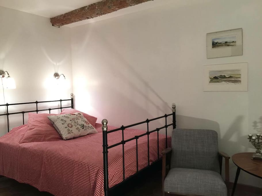 Spacious air-conditioned bedroom that sleeps two adults.