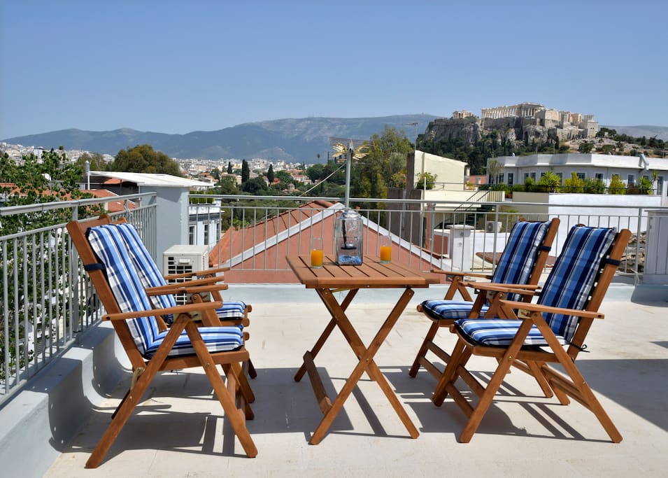 Relax and enjoy your drink with the astonished view of Acropolis