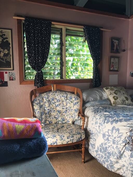 Comfy queen size bed with closet and dresser.