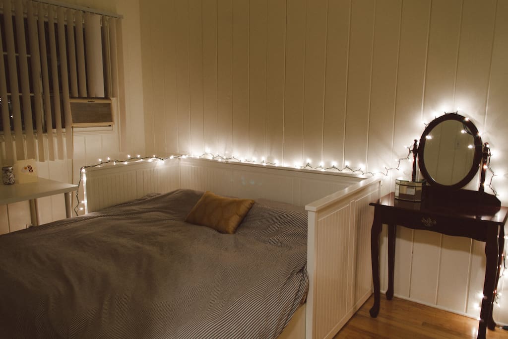 The bed pulls out to become a spacioius, king-sized bed.