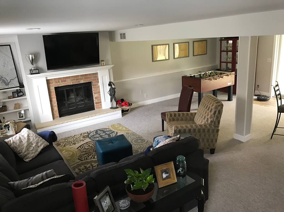 Family room with great entertainment potential, with big screen TV and plenty of sitting room.