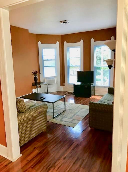 Large, brightly lit Living room
