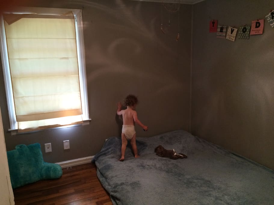 Kids room, queen bed. Raised up a little higher now on a frame.