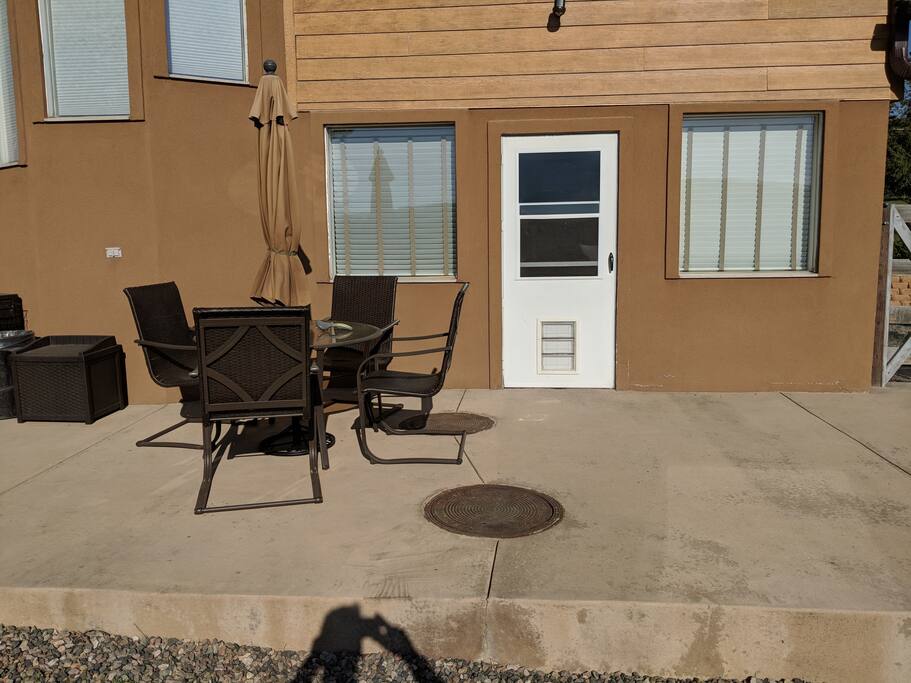 Access to unit with table and umbrella