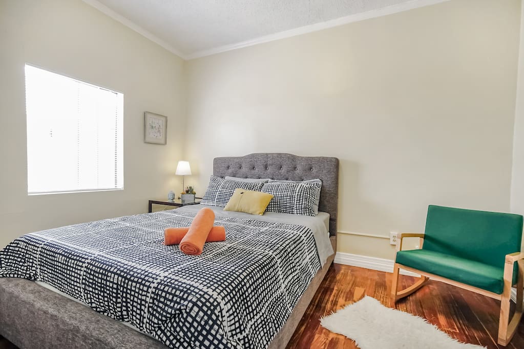 queen size bed and single mattress next to it ( its in the closet )