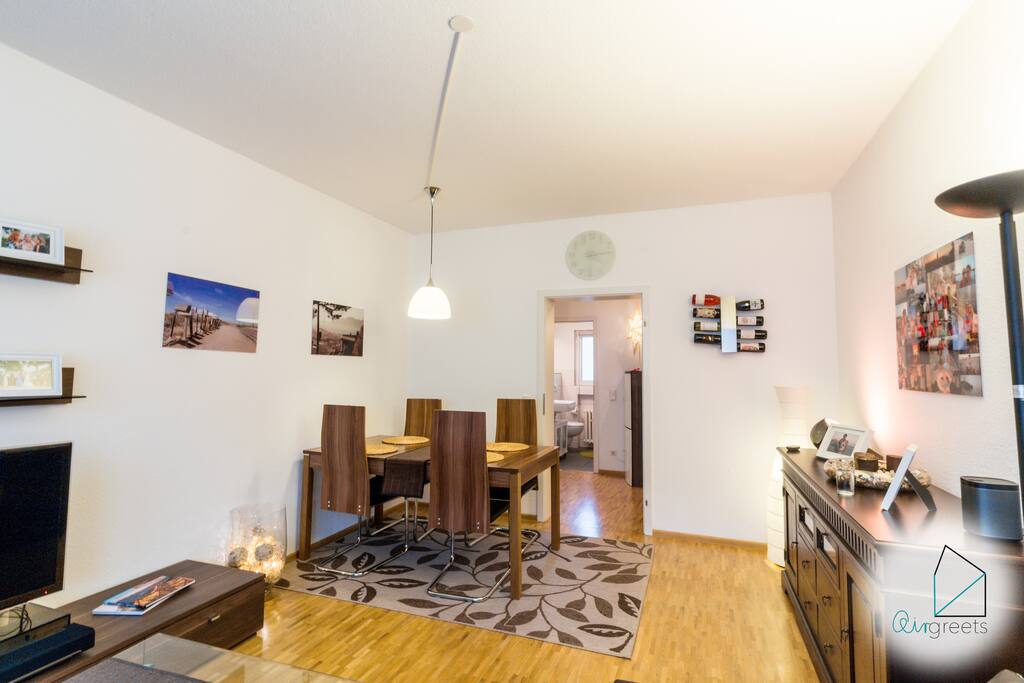 The dining room offers a wooden table to enjoy your homecooked meals.