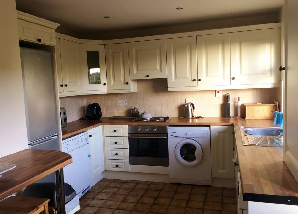 Kitchen with breakfast bar.