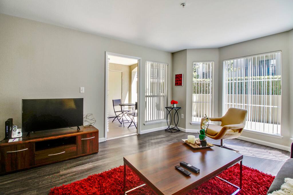 Living room with attached private patio