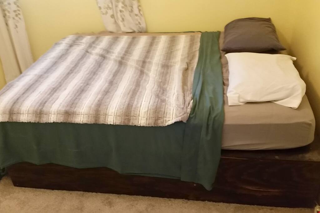 This is a super-sturdy bed made from 3/4" plywood. It's tall so that it's easy to get in and out of