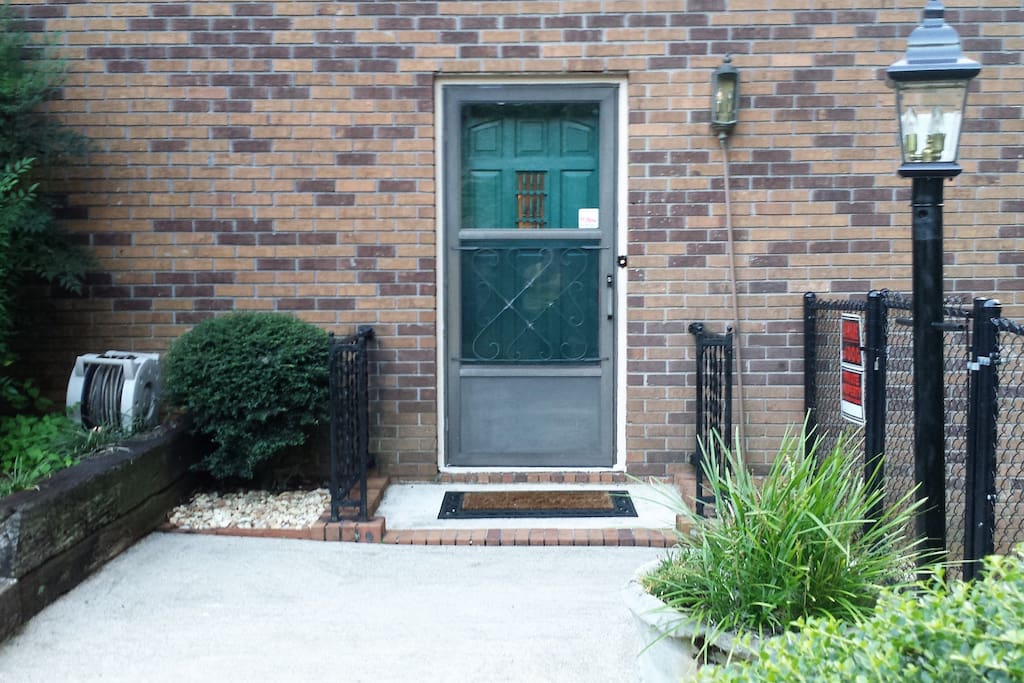 Private entrance with touch panel locking deadbolt