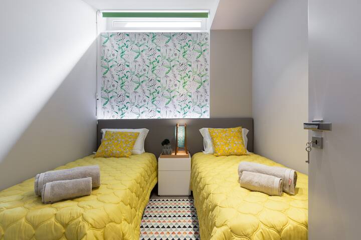 In the second bedroom, you will find two individual beds which are perfect to accommodate two more persons.