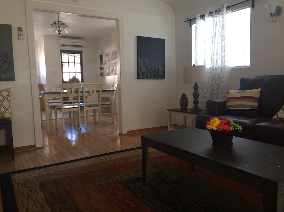 Spacious modern lit room to relax or gather with friends or family.