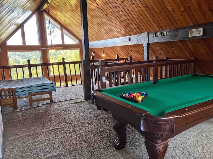 Family Fun Loft is popular for those who like pool and foosball.  There is also semi private sleeping on a queen size futon. This room includes cable TV (DirectTV).