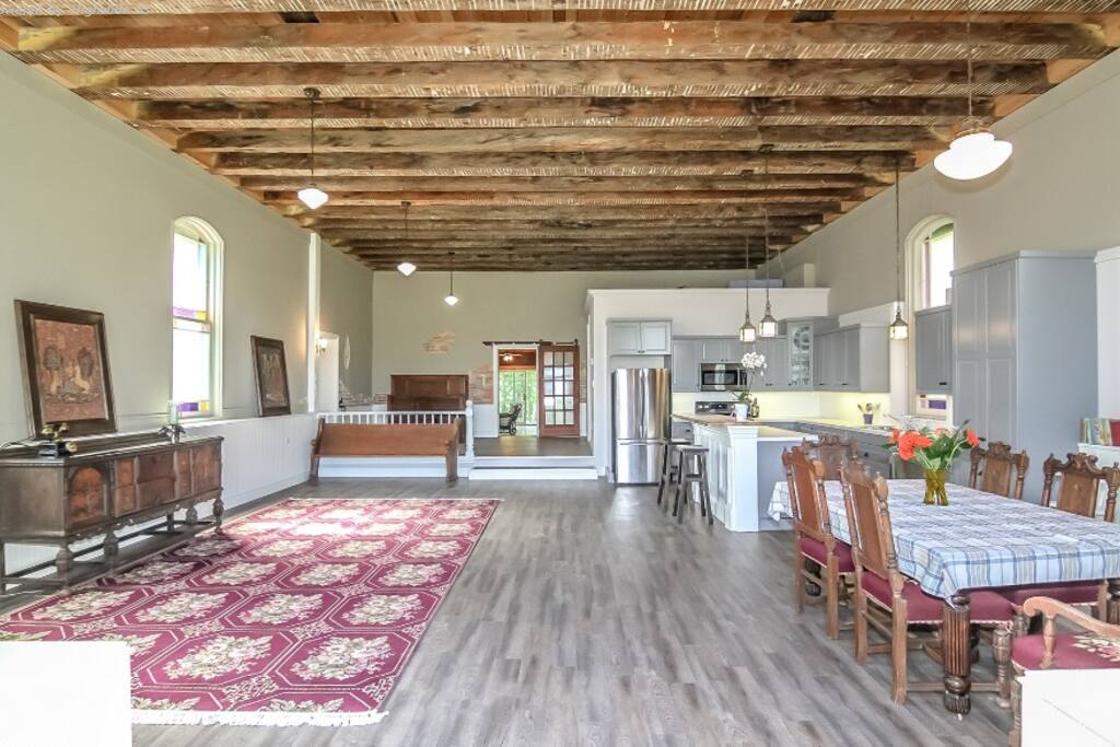 Kitchen, dining, living space in the original church