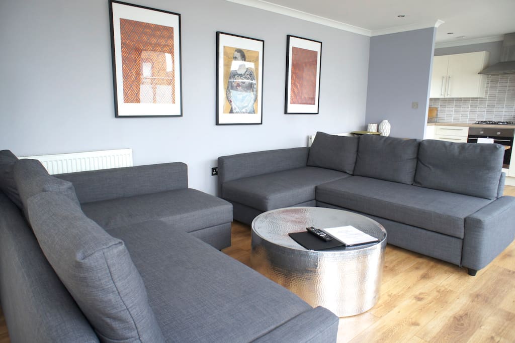 Here's your living room with two double sofa beds