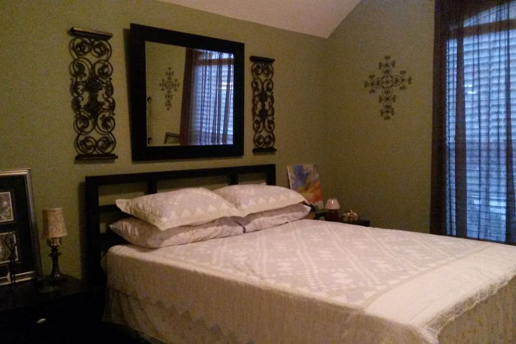 Spacious bedroom with queen bed