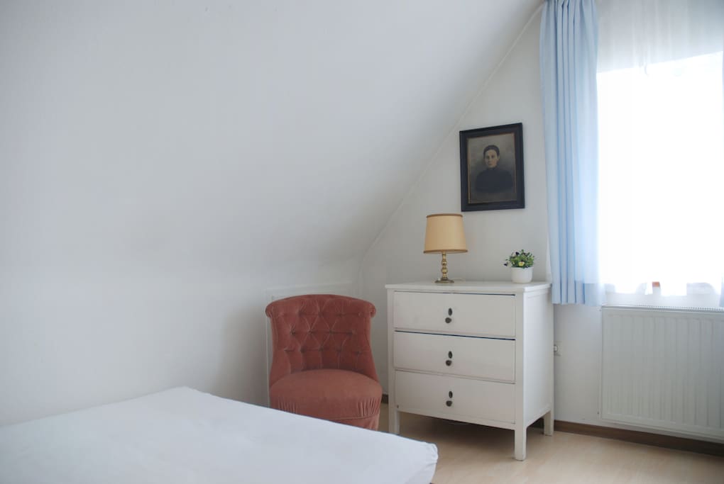 The bedroom with a comfortable double-futon and a chest of drawers