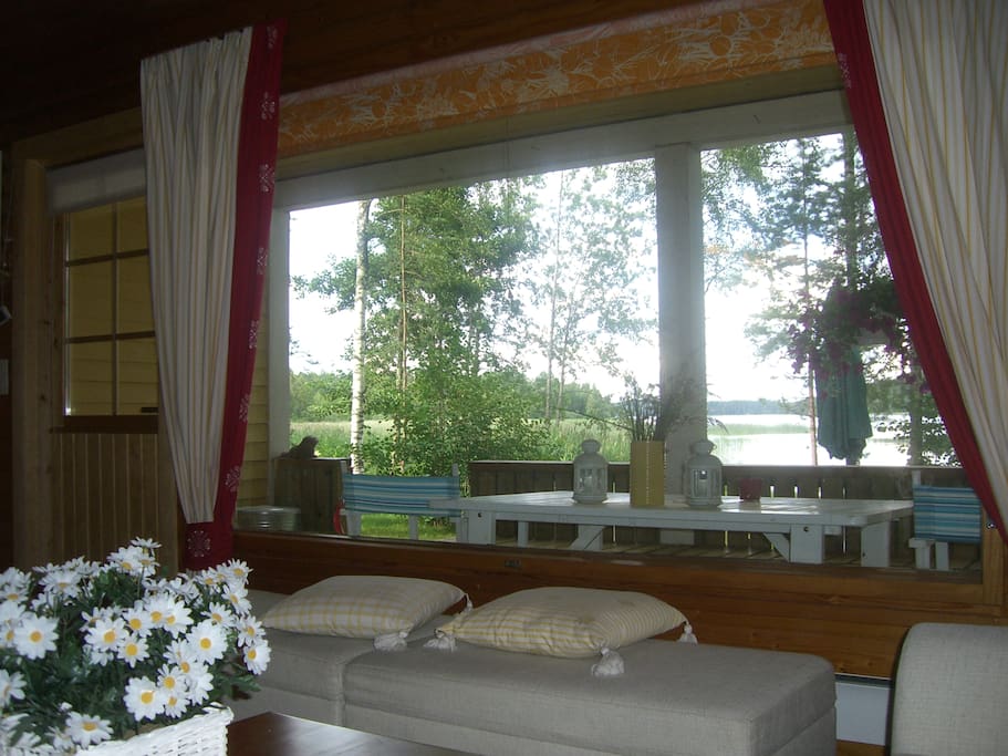 View from the house to the shore, plenty of seating in the patio area in front of the living room. It can also be accessed through a separate entrance (not shown) from the sauna/shower/toilet area