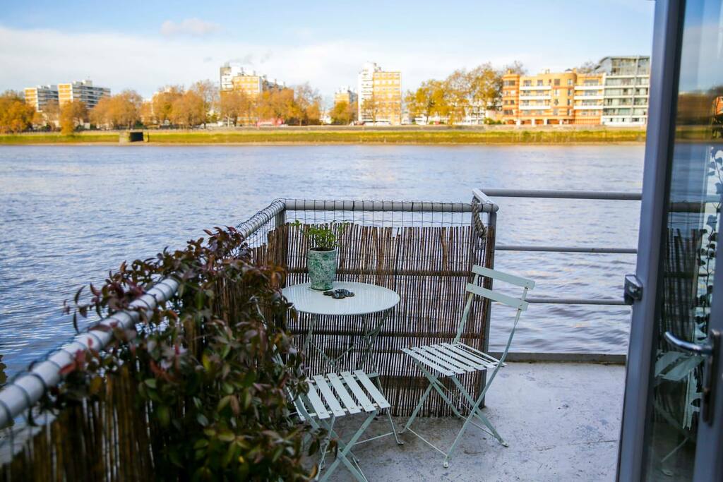 The deck with table and chairs for morning coffee or a G&T at sunset