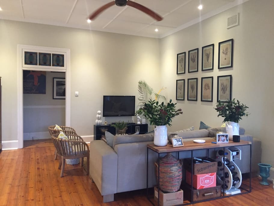 open plan lounge and kitchen, leading out to entertainment area