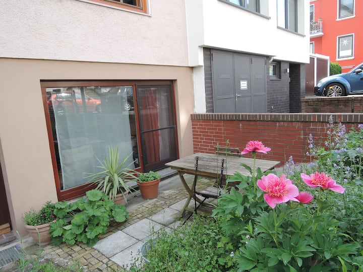 Basement apartment with small terrace