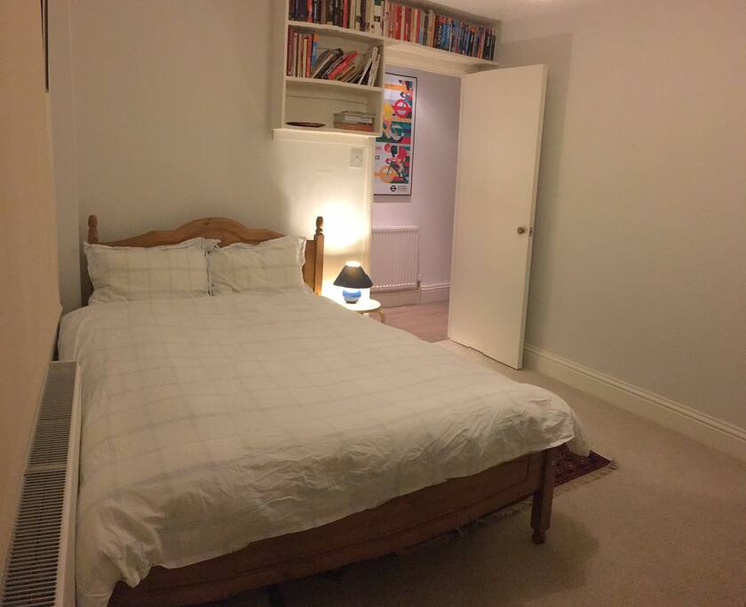 Double bed with feather duvet and pillows
