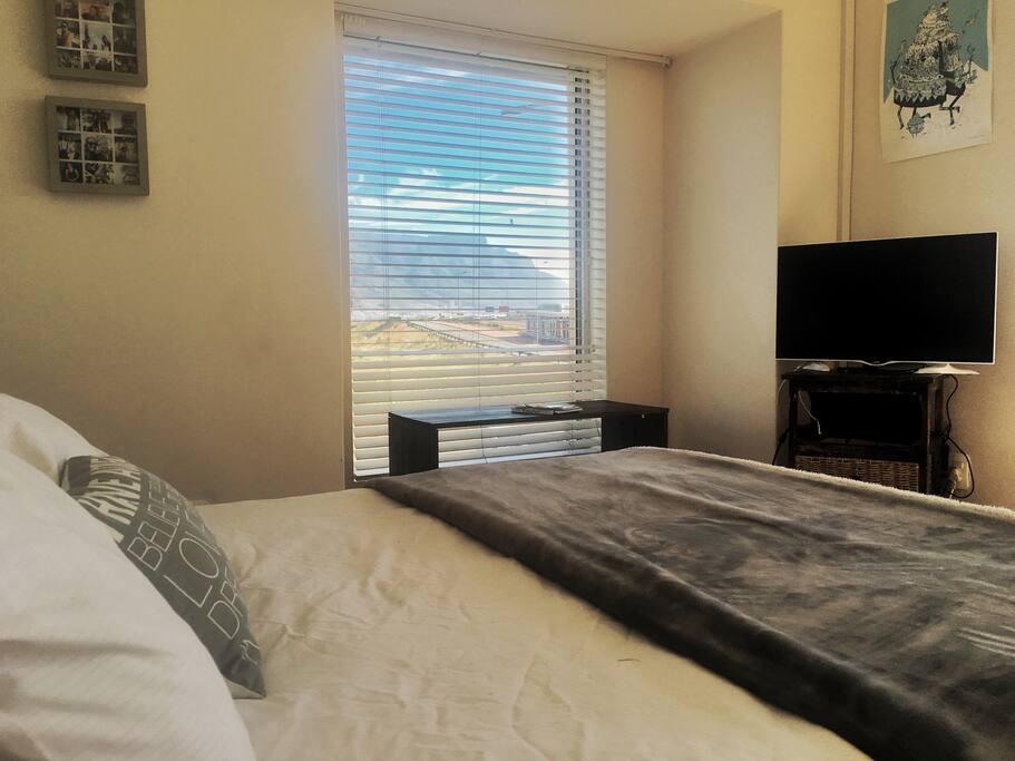 Main bedroom with Table mountain views & beach views