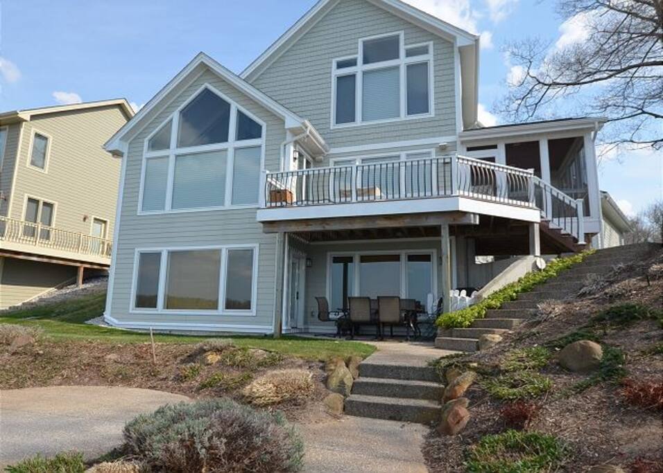 Terrace, screened in 3 seasons room, lower level patio with plenty of outdoor seating and both gas/wood burning fire pits