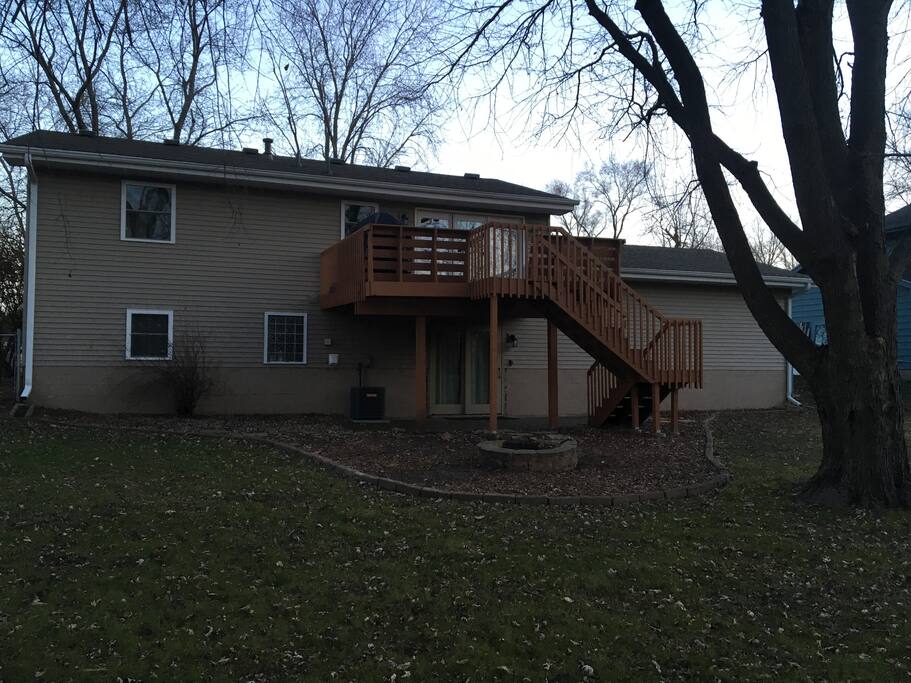 Back view of house and backyard
