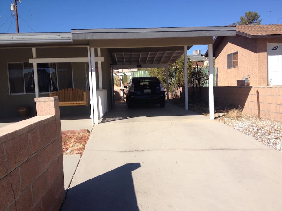 Carport with plenty of room for more cars