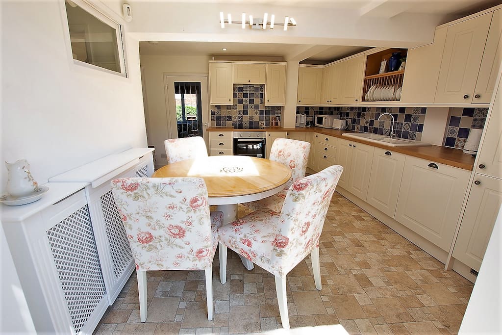Kitchen and dining space, all modern white goods including dishwasher, washing machine and tumble dryer
