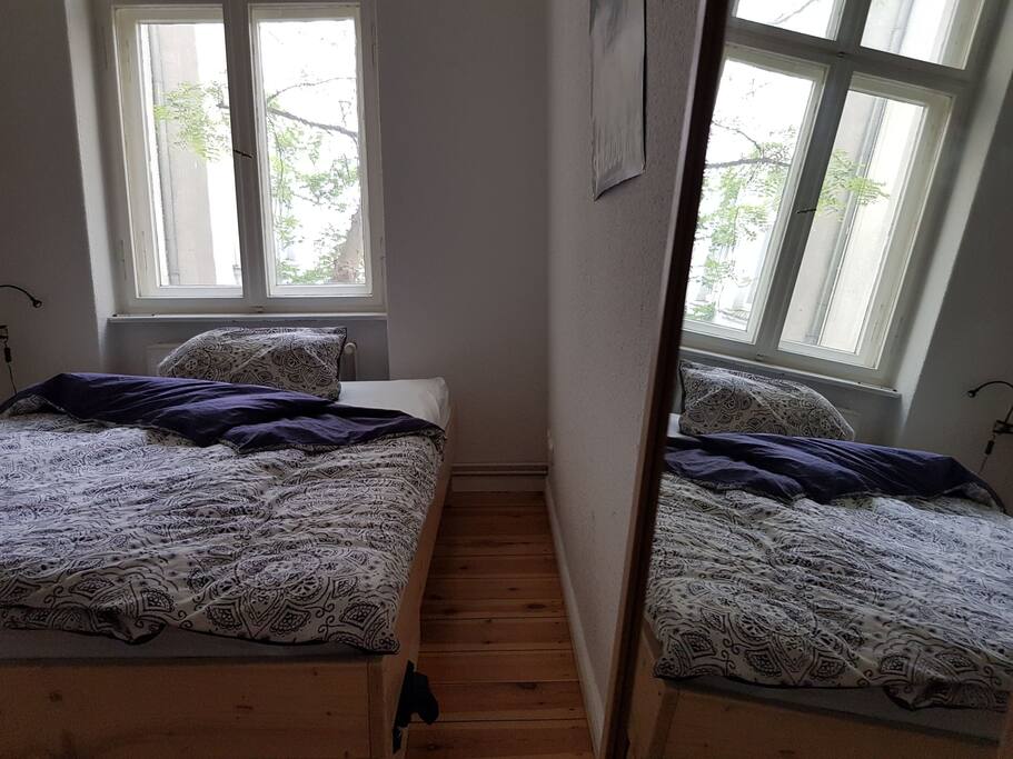 The bed room with mirror