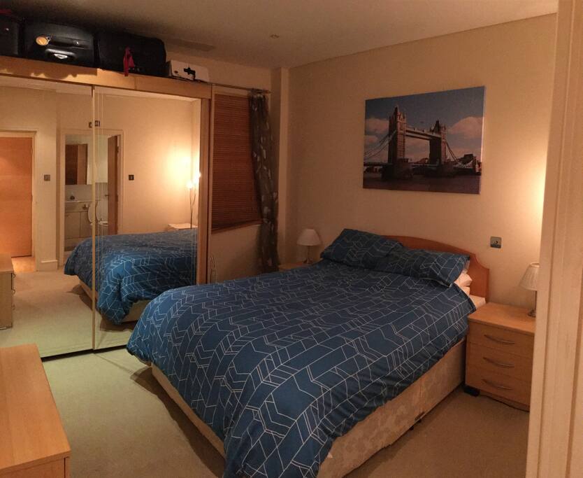 Large bedroom with ensuite and cupboard space