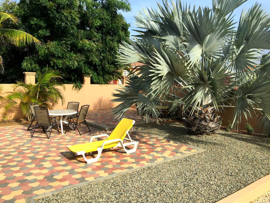Tropical Pool Side Lounging area and Dining Area with BBQ