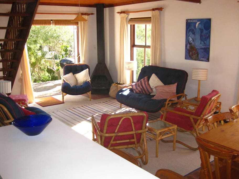 Open plan lounge, dining room and kitchen, opening onto the garden