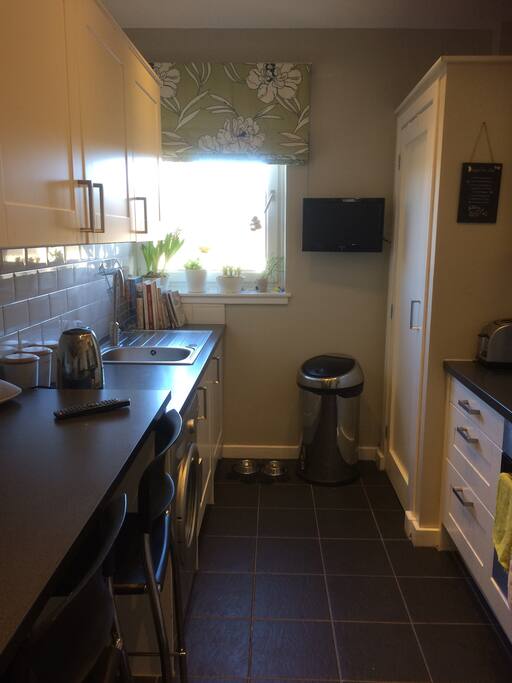Kitchen with breakfast bar.