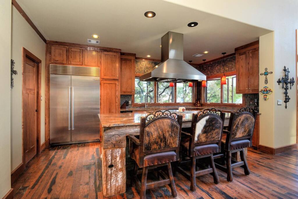 Gourmet kitchen feature wolf range and Sub zero.
