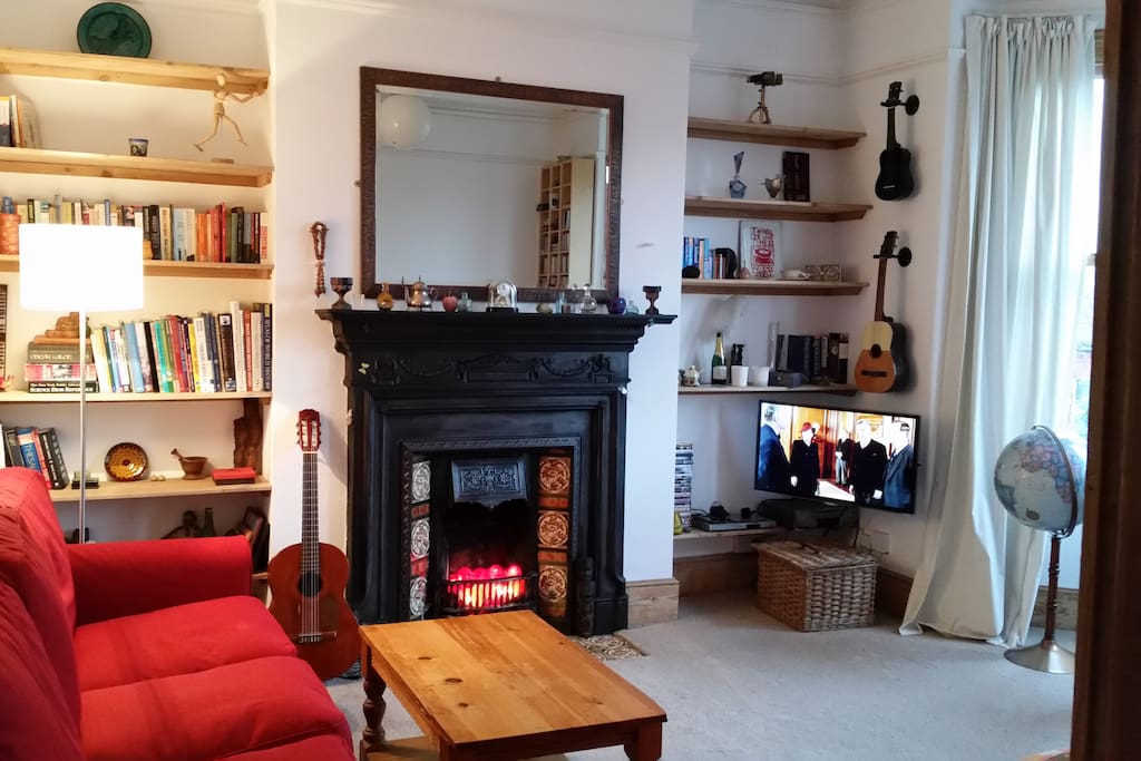 period living room with interesting selection of reference books and novels, TV with Netflix, i-player and more